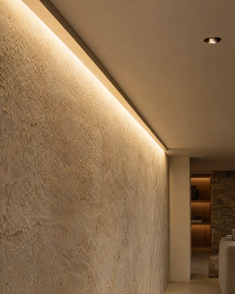 Concept visualization of recessed cove lighting on a plaster wall