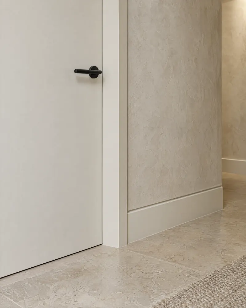 Concept visualization of a flush door and shadow-line baseboard in a finished basement